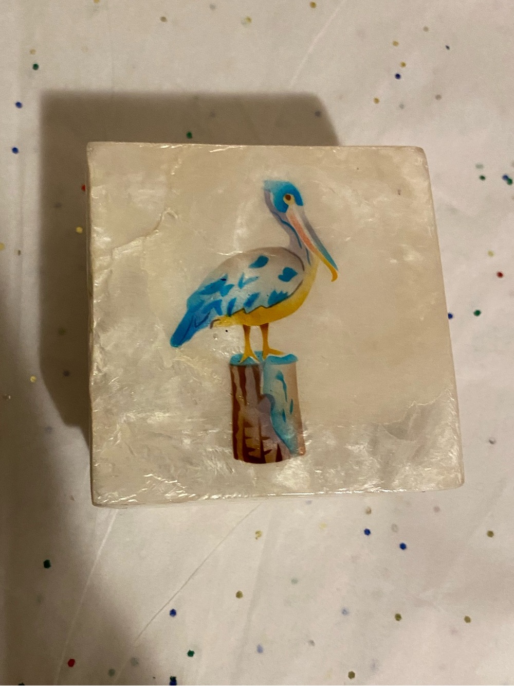 Handmade White Shell Tile with Blue & Yellow Pelican Art